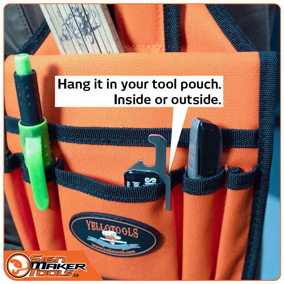BodyGuardKnife EVO clipped in an orange tool pouch among other tools