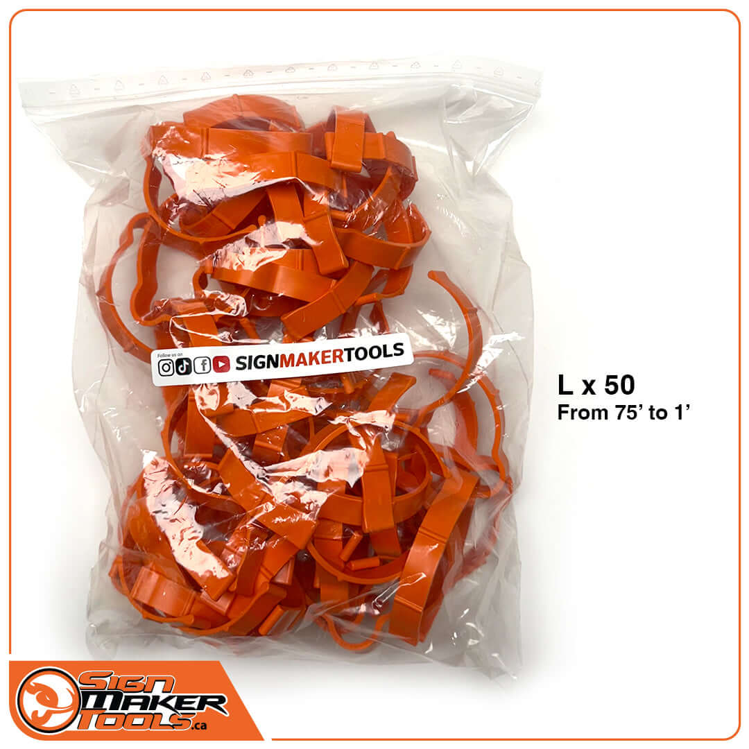 Bag of fifty orange SpeedClip roll holders for organizing vinyl rolls
