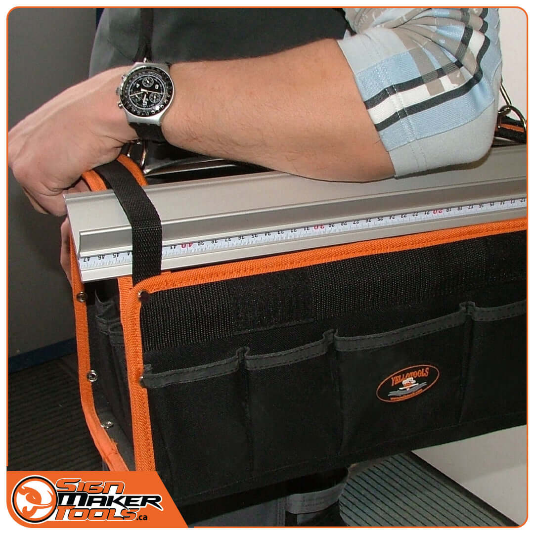 Carrying the Sign Maker Pro Tool Bag with a long ruler secured in side pocket