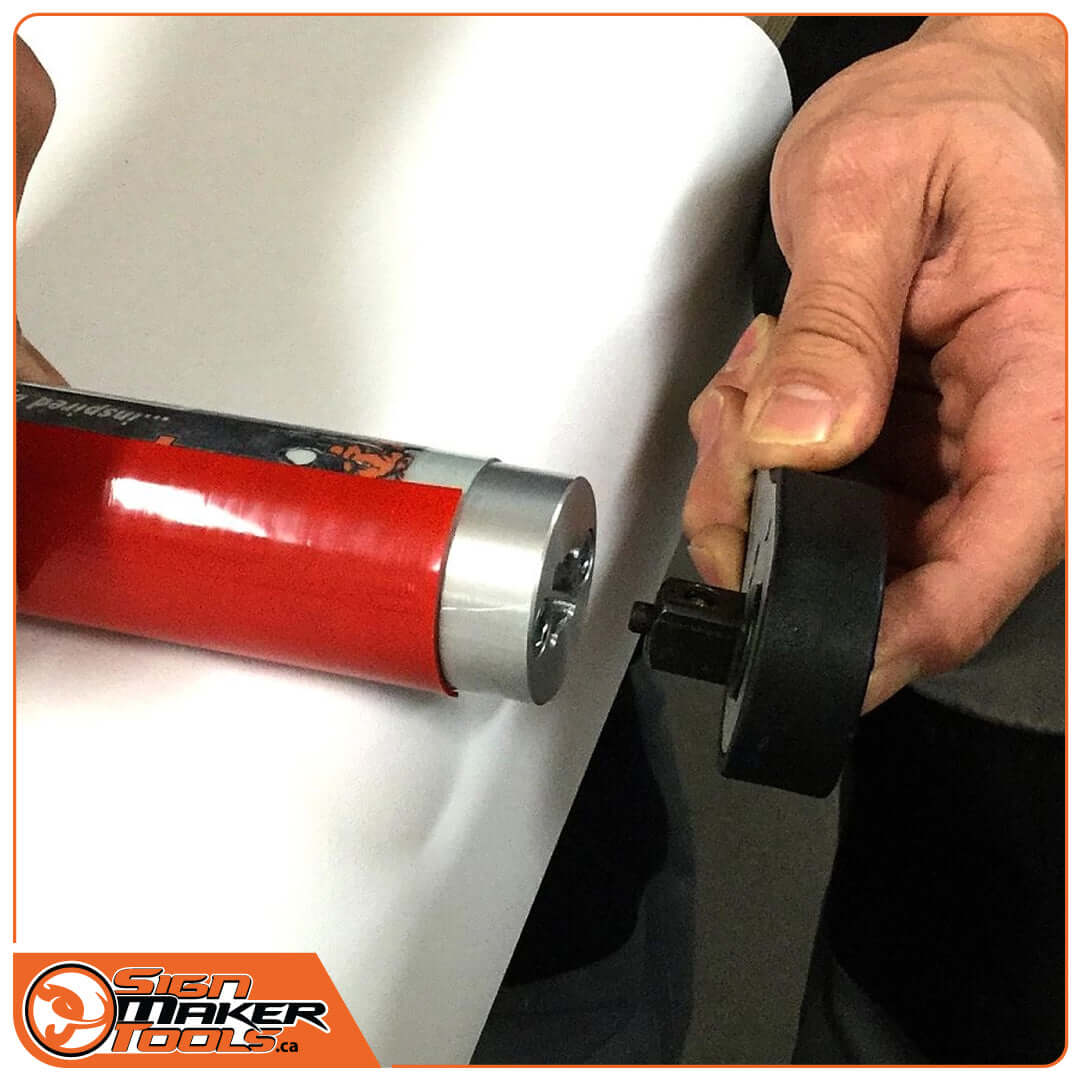 Attaching black connector cap to the RapidRemover tool with red body