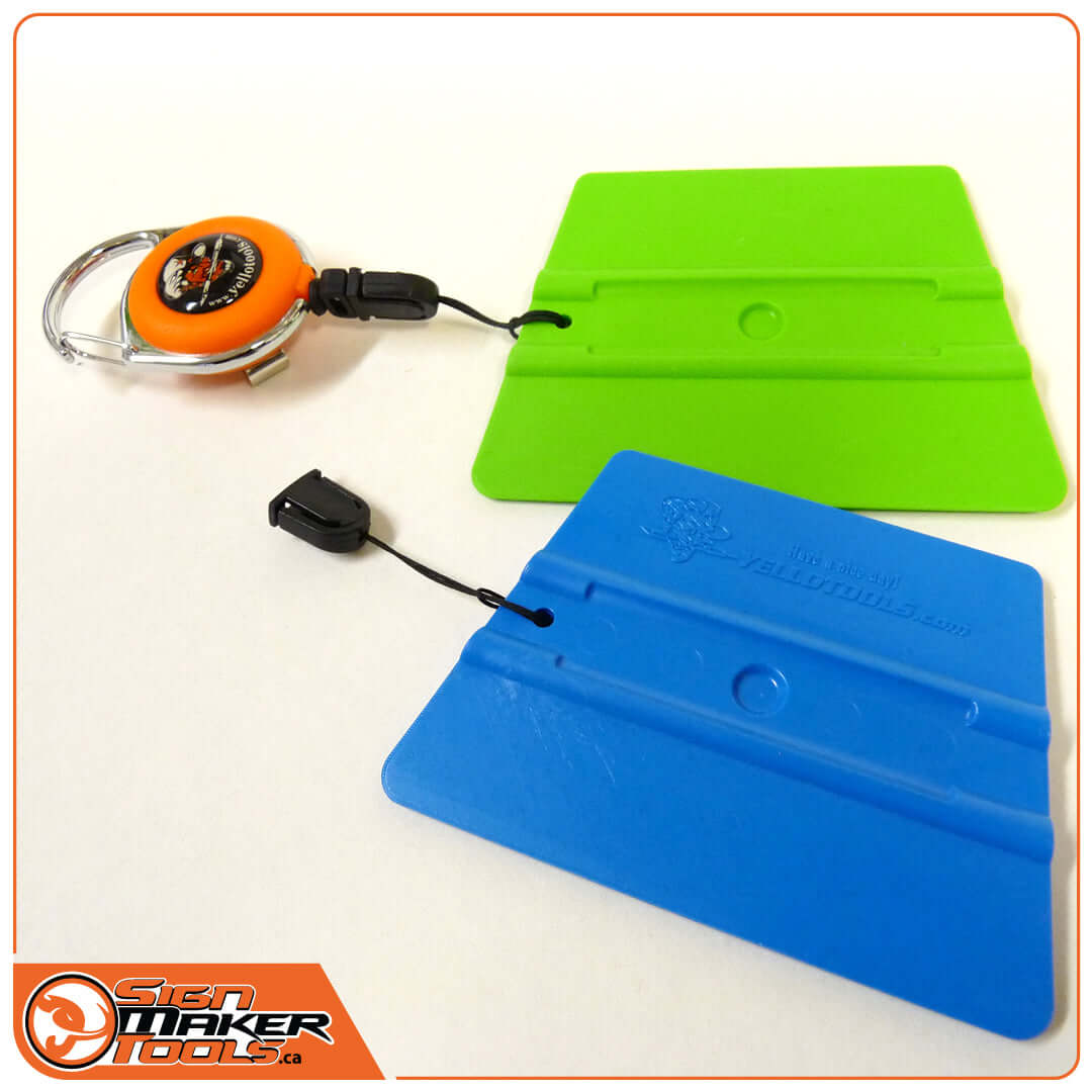 EasyCord retractable holder attached to two colored squeegees