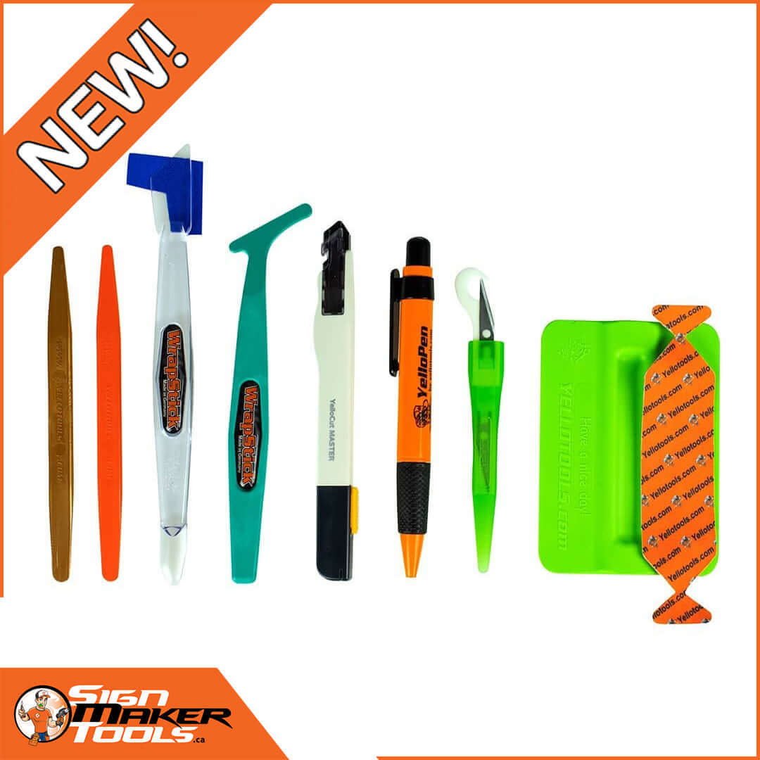 Kit components including squeegees, knives, pens, and wrap tools arranged on white background