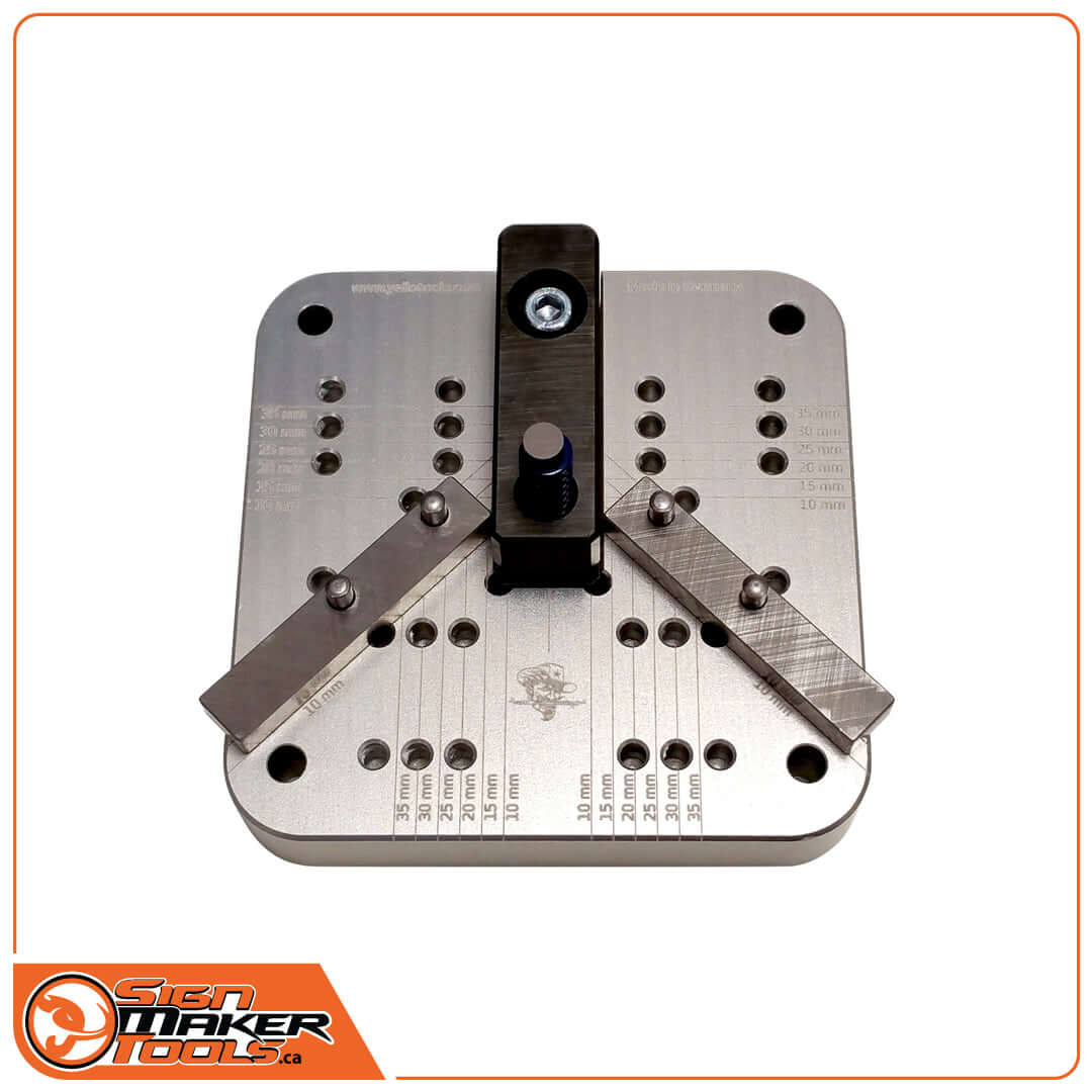 Close-up of guide plate for PowerPunch Hole Module with metric markings