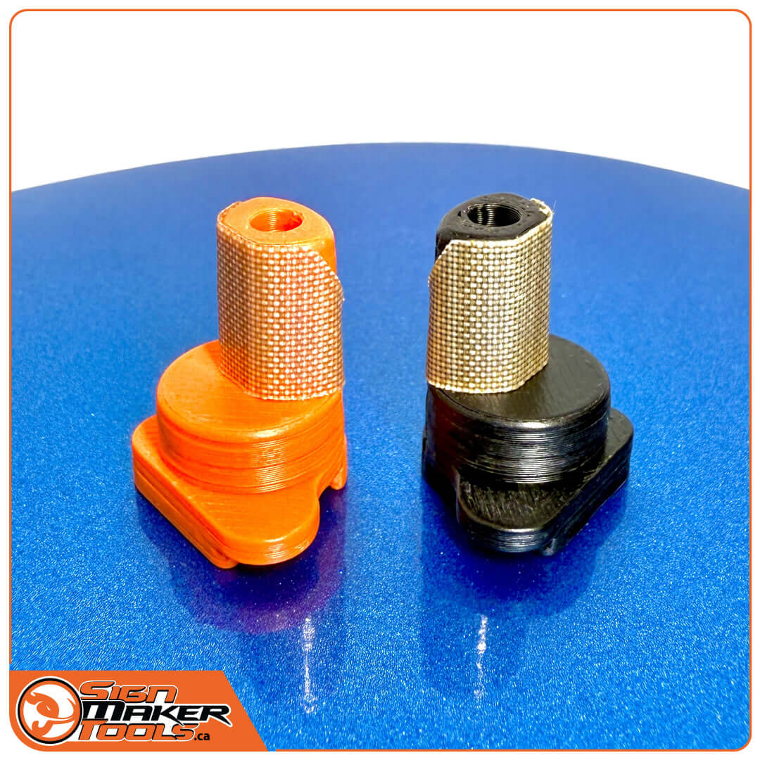 Orange and black ProTrim Magnetic Cut Guides for car wrapping displayed on blue surface