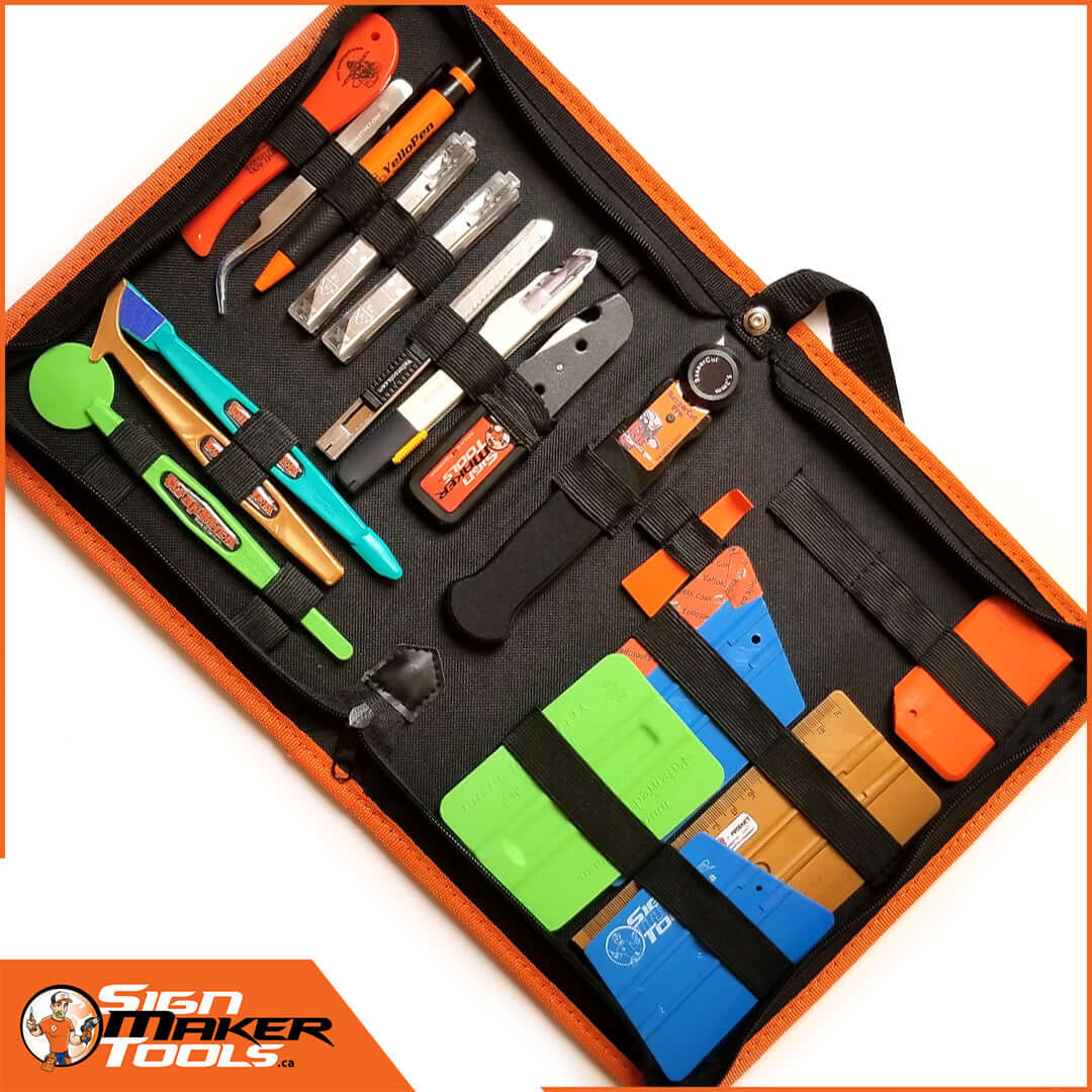 Open SMT Case displaying signmaker tools organized inside with squeegees, blades, and accessories