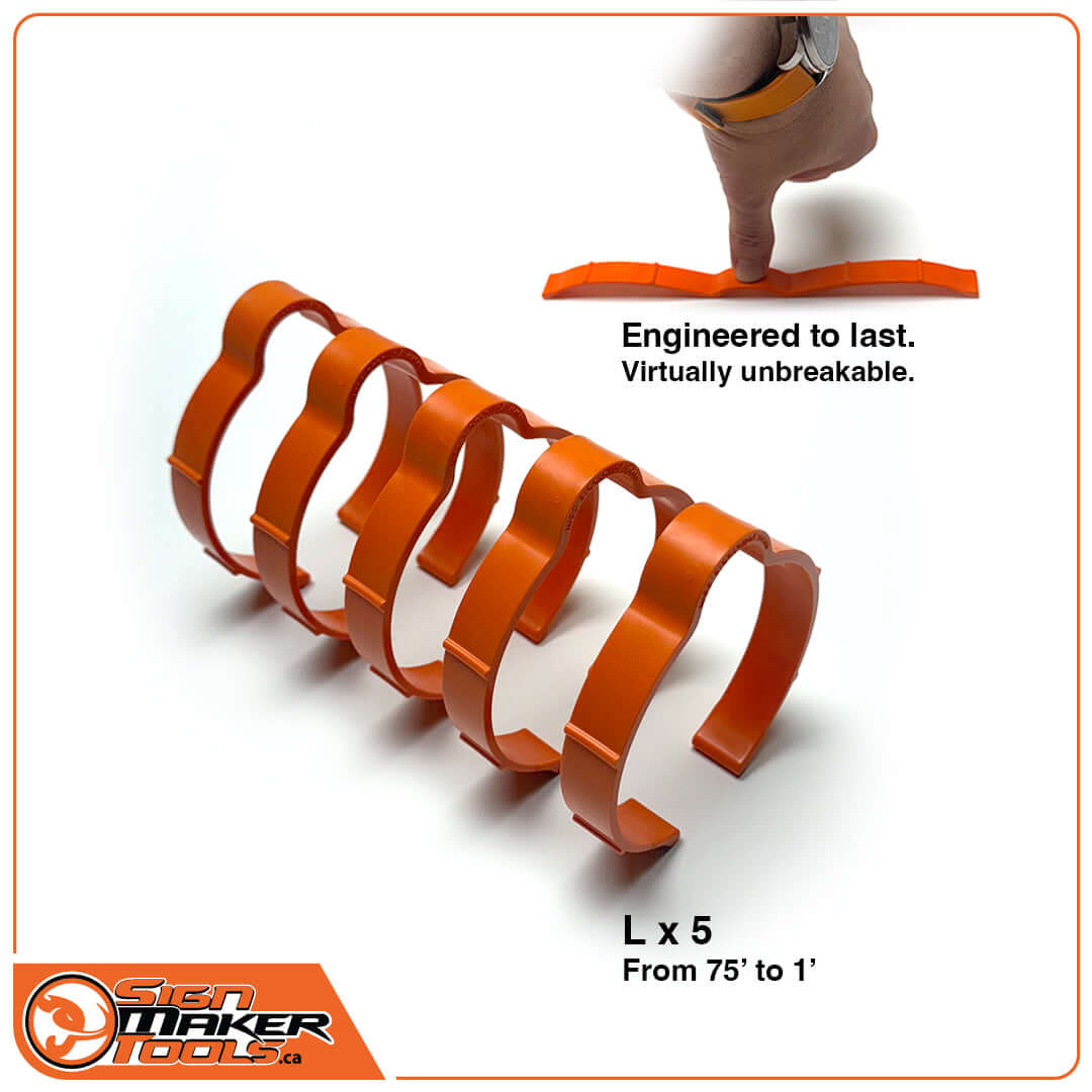 Five orange SpeedClip vinyl roll storage clips with demonstration of unbreakable design