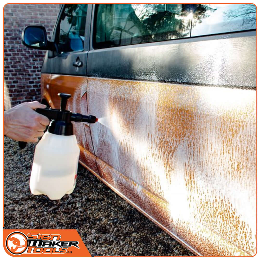 Applying foam solution to vehicle side panel with pump sprayer