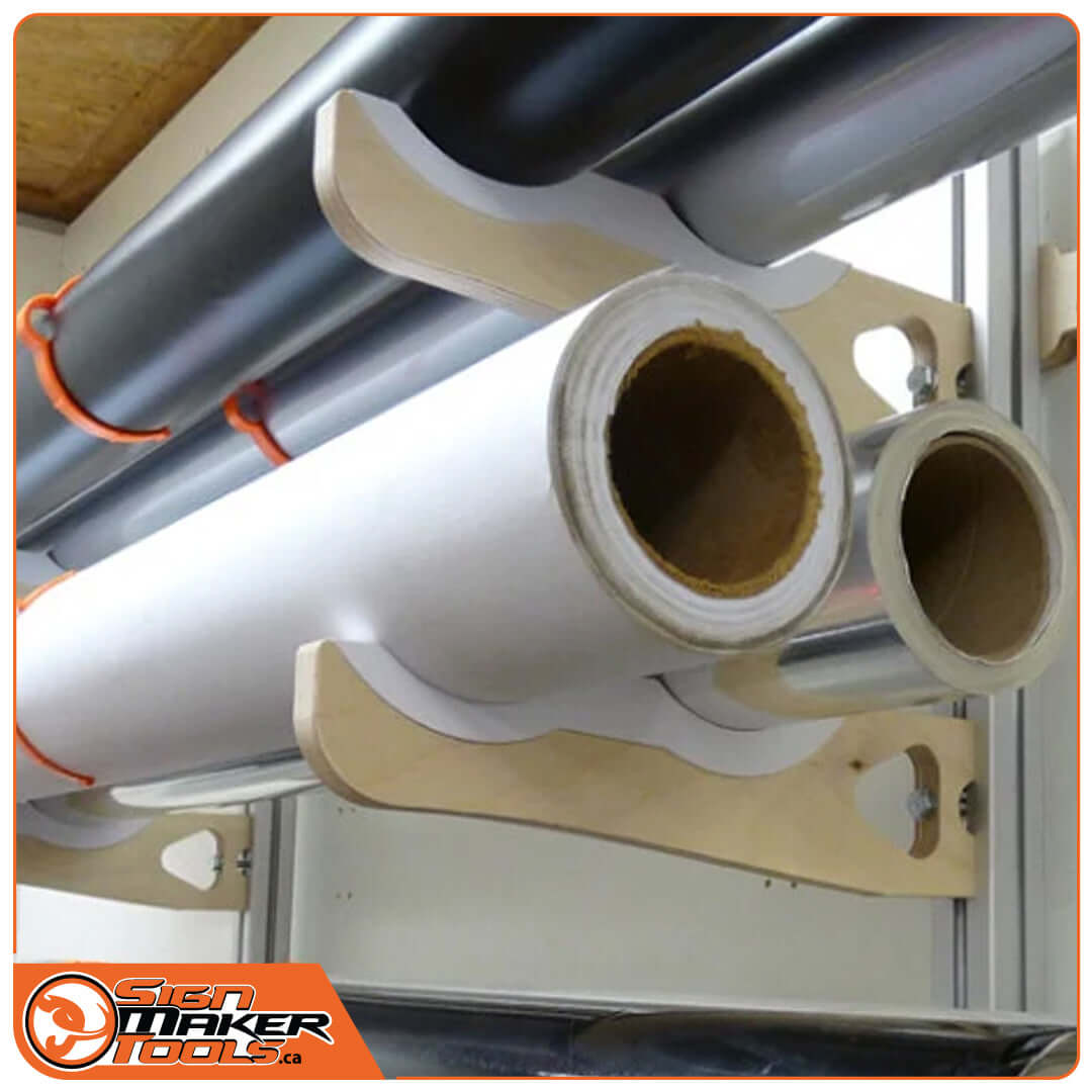 Close-up of WaveHolder V-Bracket securely holding two media rolls