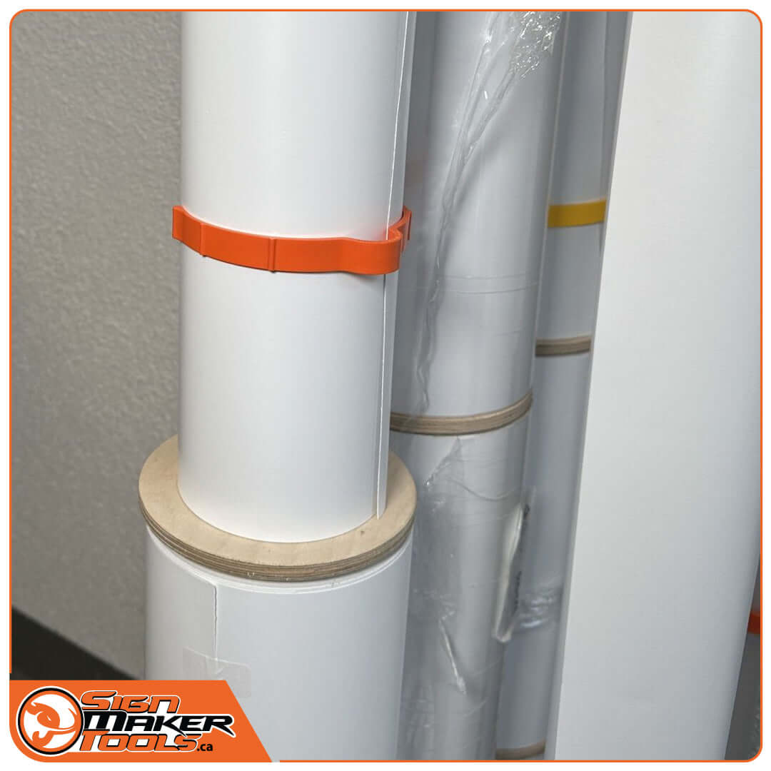Vinyl rolls stacked using a double-cross insert and orange band