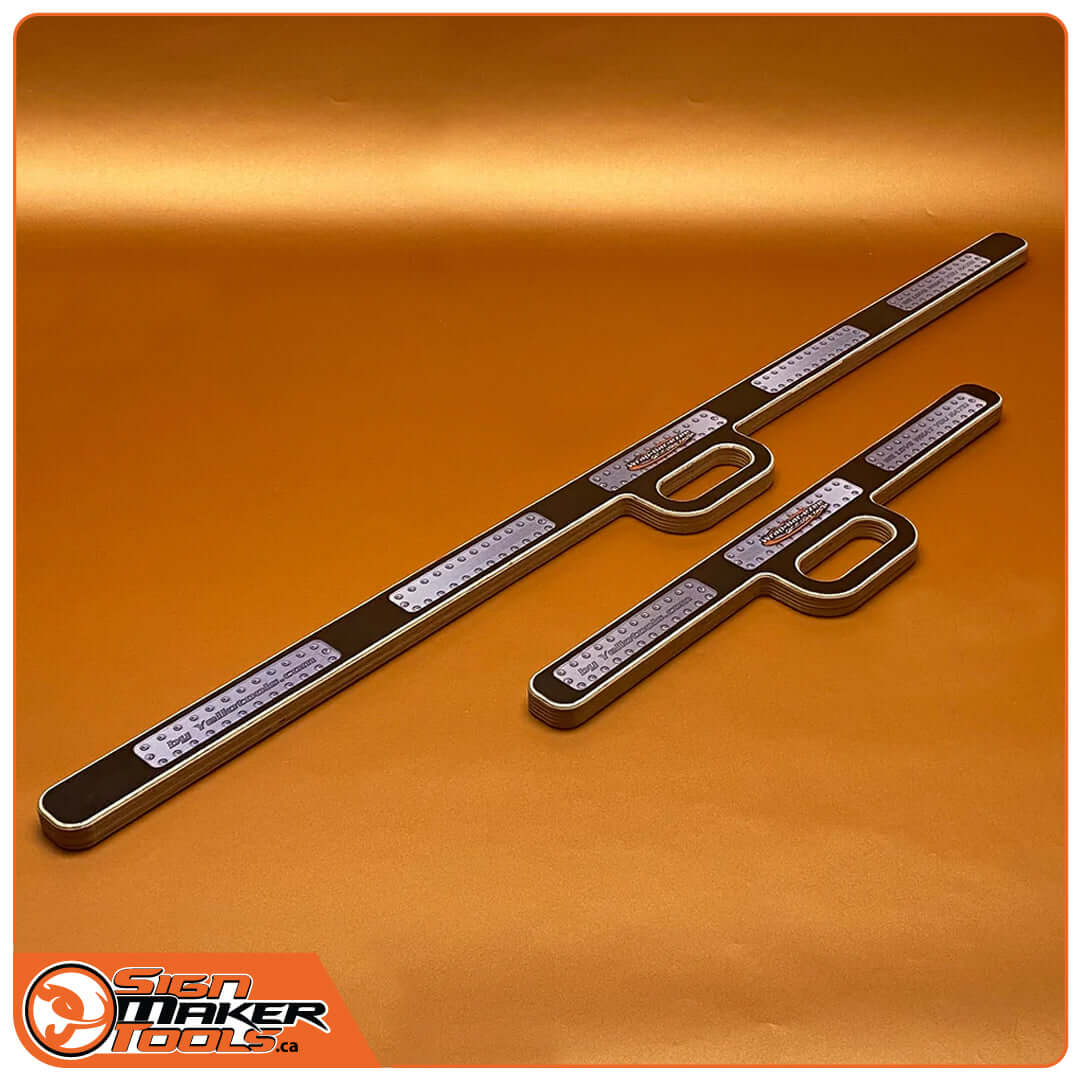 Wrap-Bar-Ezee car vinyl pre-tensioning tools set displayed on an orange background