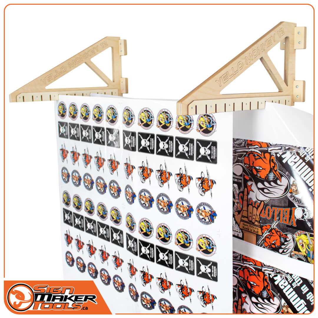 YelloMonkey 12 slot racks holding printed vinyl sheets for drying