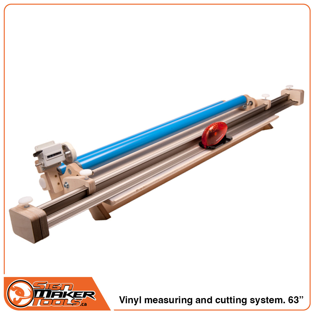 All-in-one vinyl measuring and cutting station for sign makers showing the AppFix Roll 'N' Cut tool