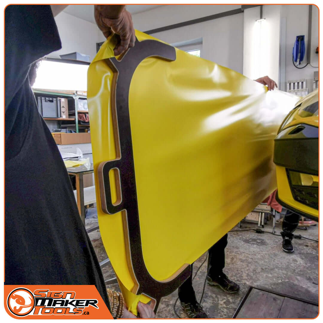 Using the Wrap-U-Bumper to install yellow wrap film on a car bumper