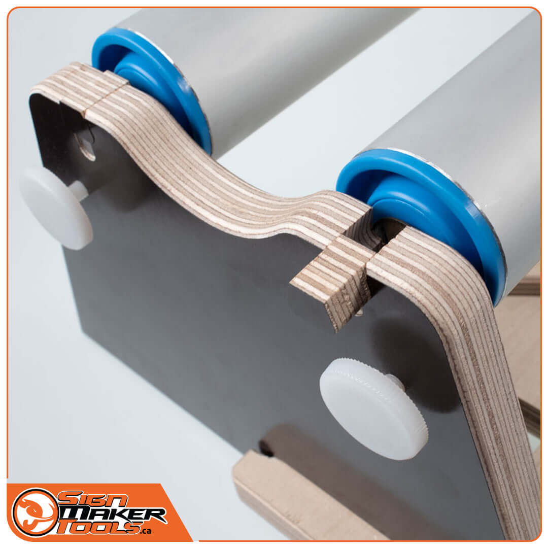 Close-up of ball-bearing mounted rollers on AppFIX application tape dispenser