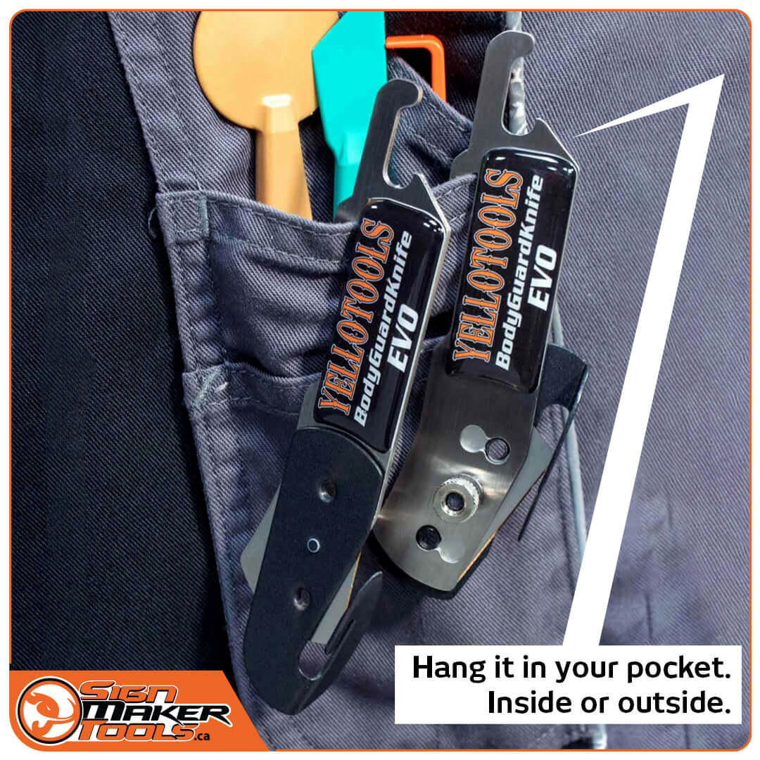 Two BodyGuardKnife EVO cutters clipped to a work pocket for easy carrying