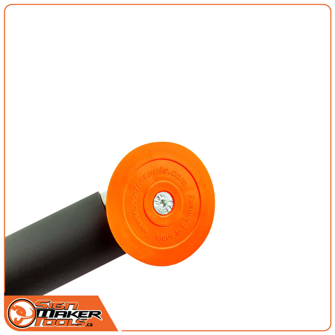 Close-up of the orange safety end cap on the aluminum handle