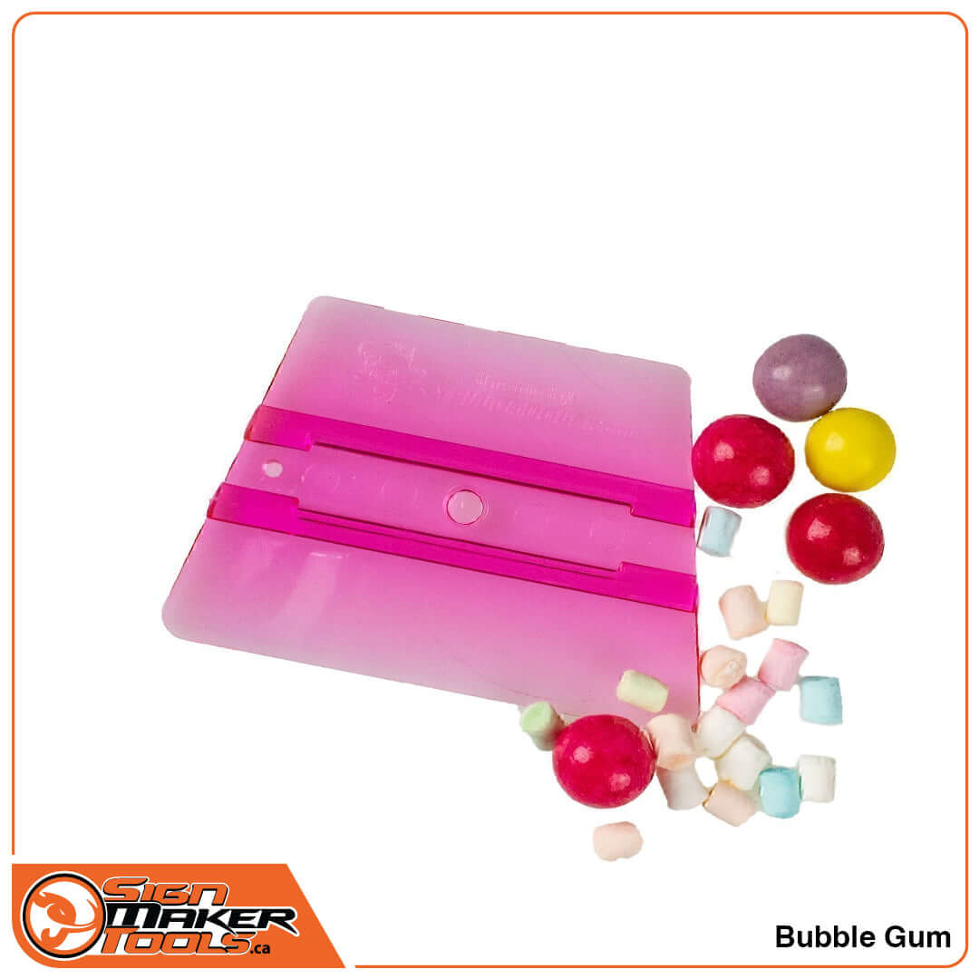 Pink SmellGood ProWrap Bubble Gum squeegee with gumballs and candy pieces