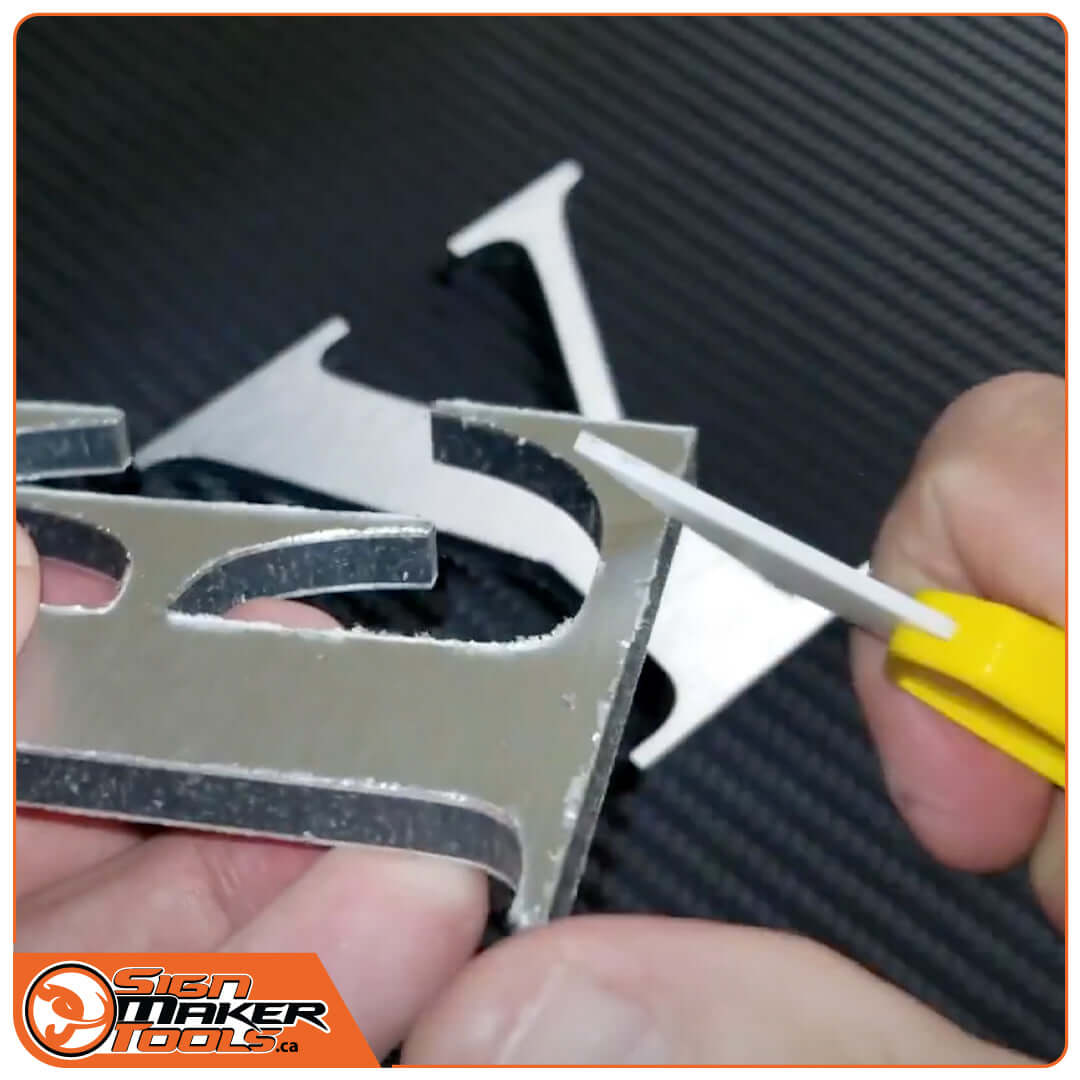 Precision cleaning of metal letter edges using the CeraSwitch ceramic blade