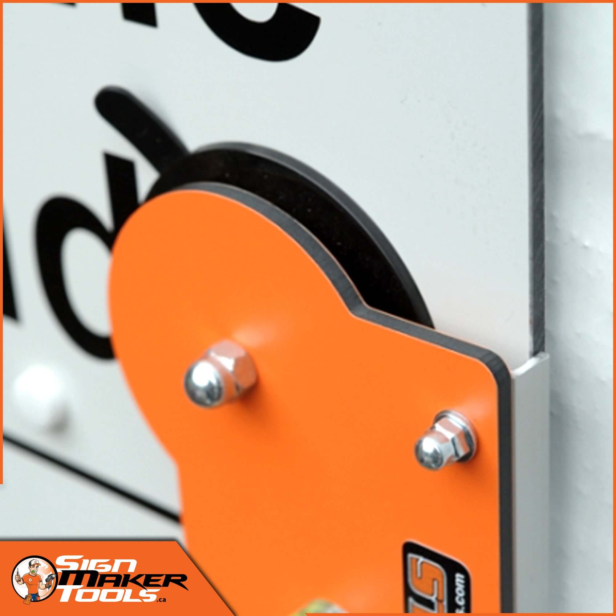 Close-up of the SignLevel ALS suction cup mounting tool gripping a sign