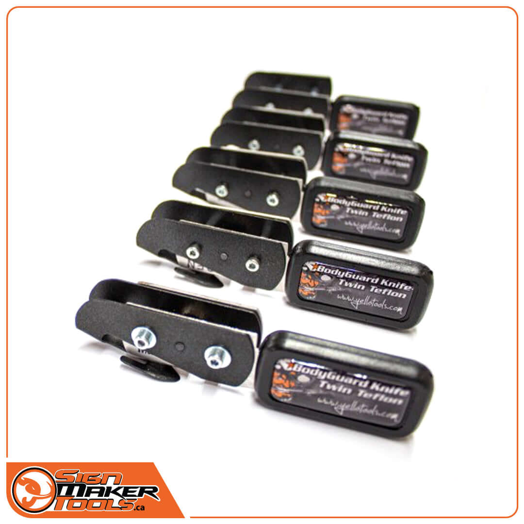 Multiple BodyGuardKnife Twin Teflon safety knives lined up for different projects