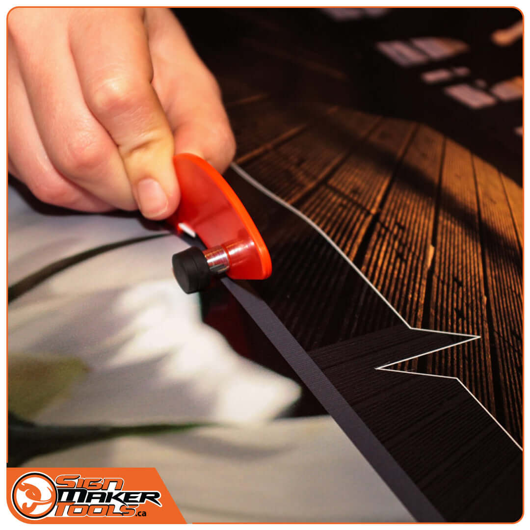 Using the Tinny-Cut vinyl cutter to make precise cuts on sign material