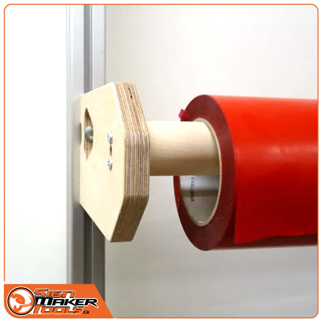 V-Bracket Fix holding a red vinyl media roll for signmaking applications