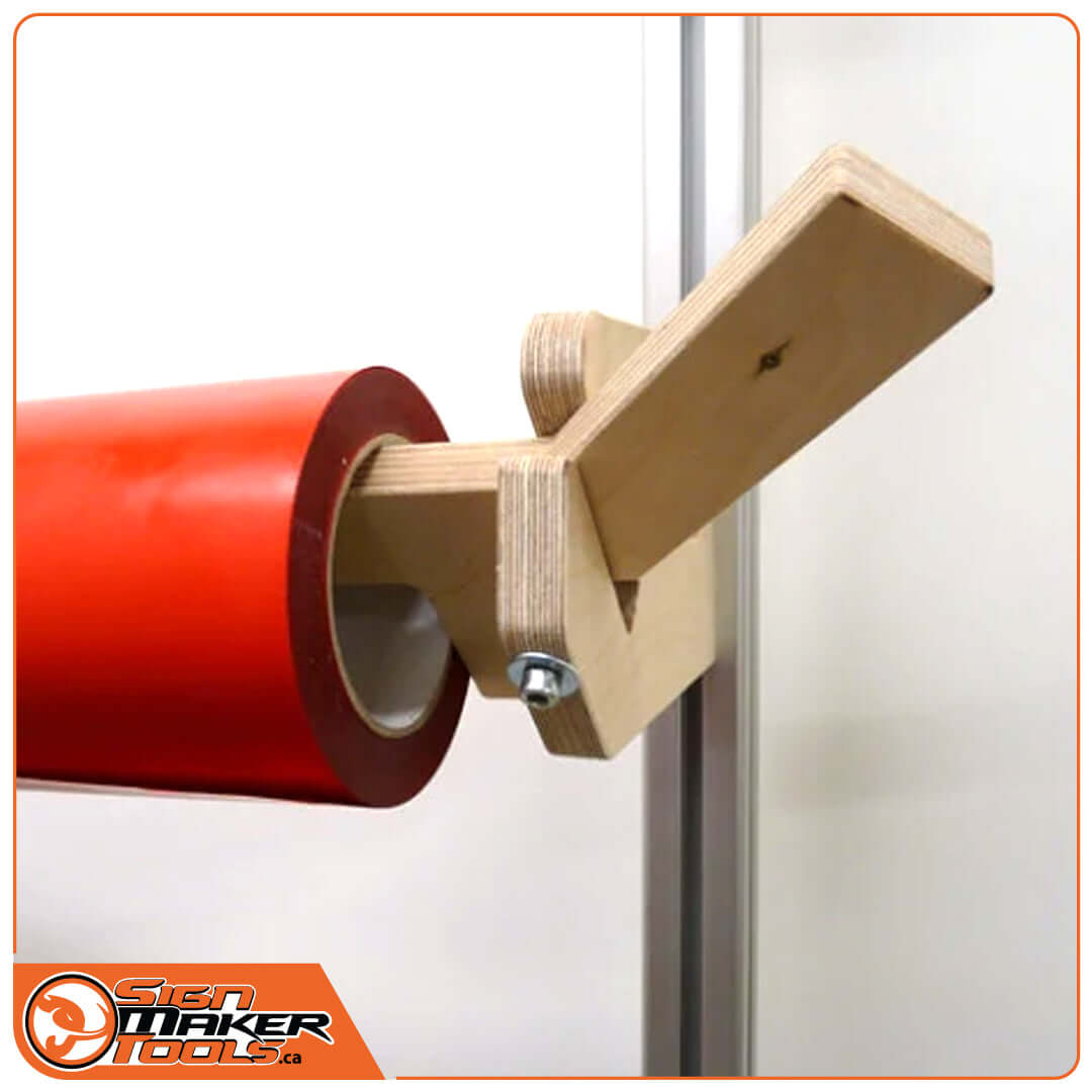 V-Bracket Move in action with red media roll demonstrating easy hook design