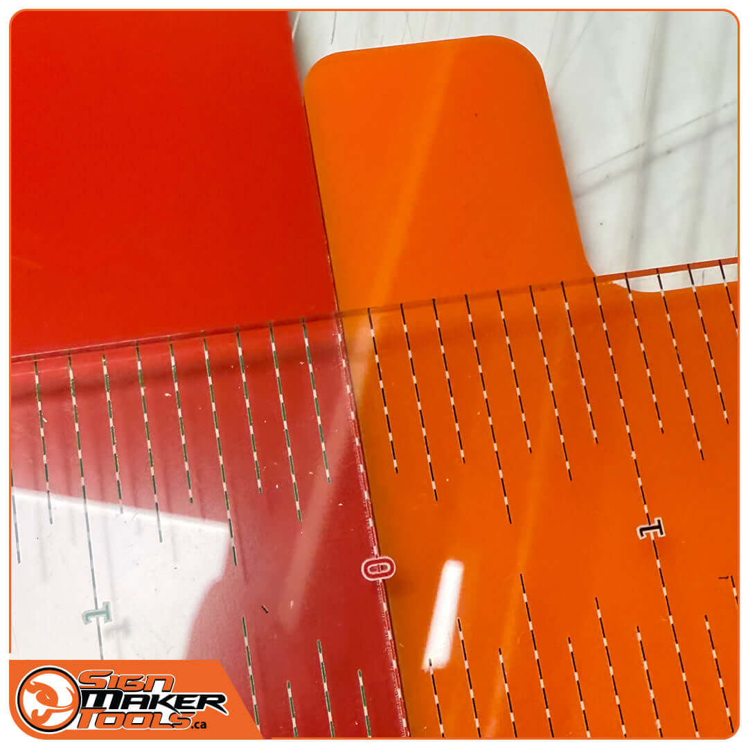 Vinyl print being aligned using the PrintJoggle alignment scale