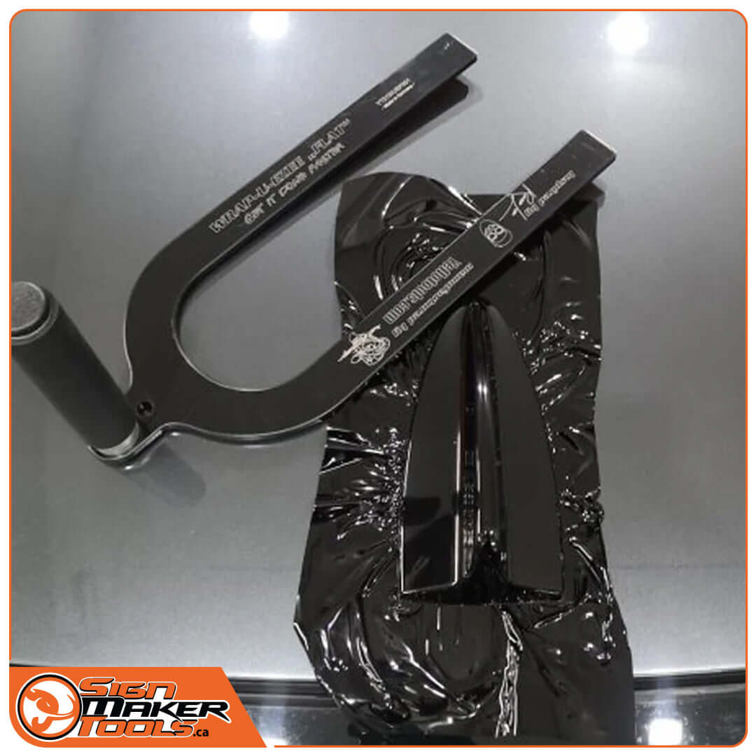Wrap-U-Ezee Flat wrapping tool assisting with vinyl application around a shark fin antenna