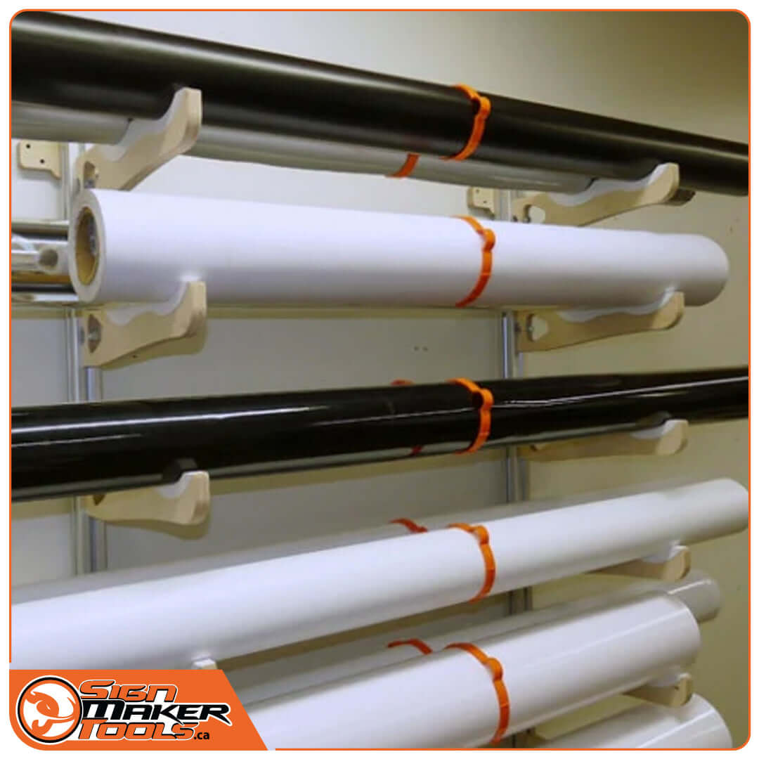 Multiple media rolls stored on WaveHolder V-Brackets in a vertical rack system